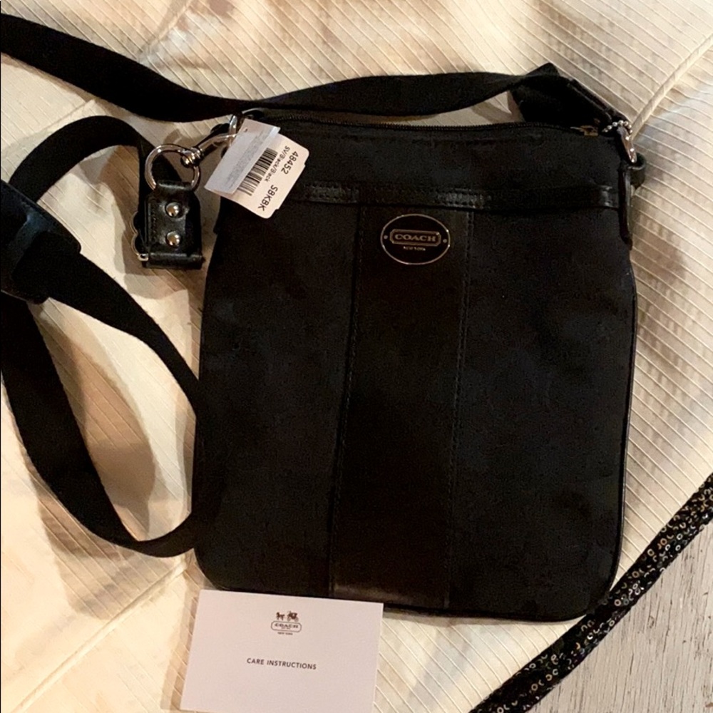 Coach crossover bag approximately 9” x 7”